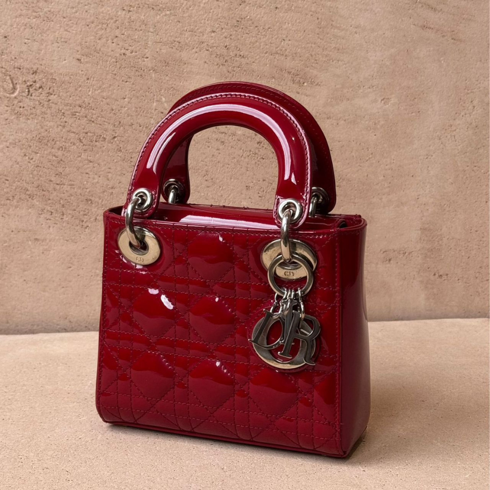 Red quilted patent leather handbag with top handle for women