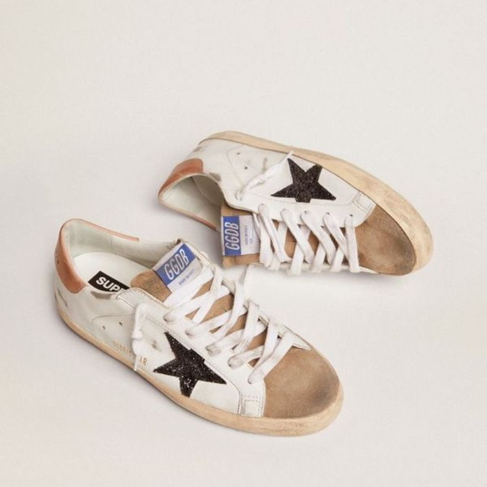White premium distressed sneakers with black star, suede toe cap and GCDS logo – stylish streetwear shoes for men and women