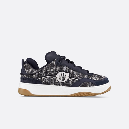 Modern black designer style sneakers with textured fabric and anti slip outsole
