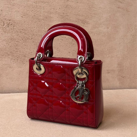 Red quilted patent leather handbag with top handle for women