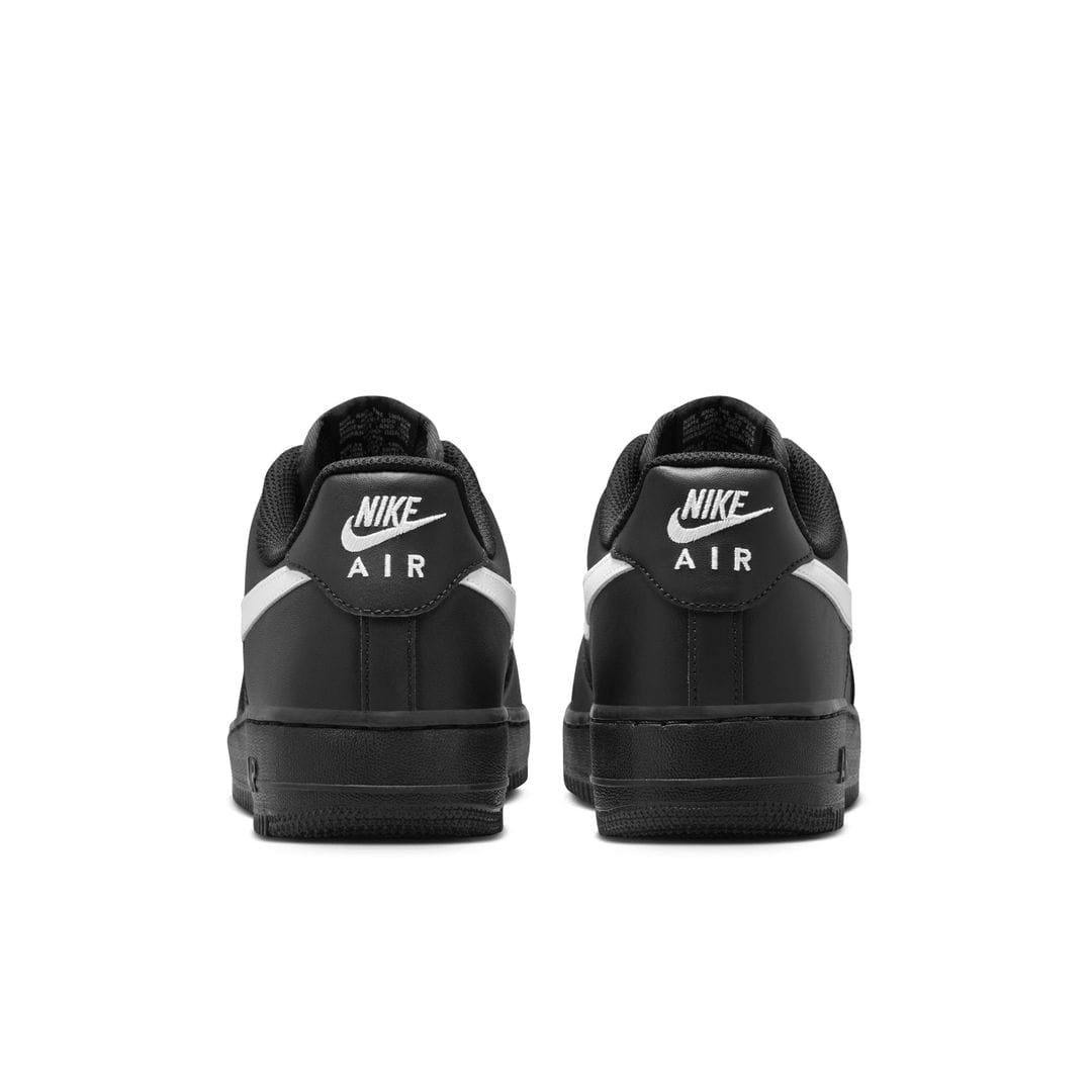 durable black sneakers with cushioned sole for comfort