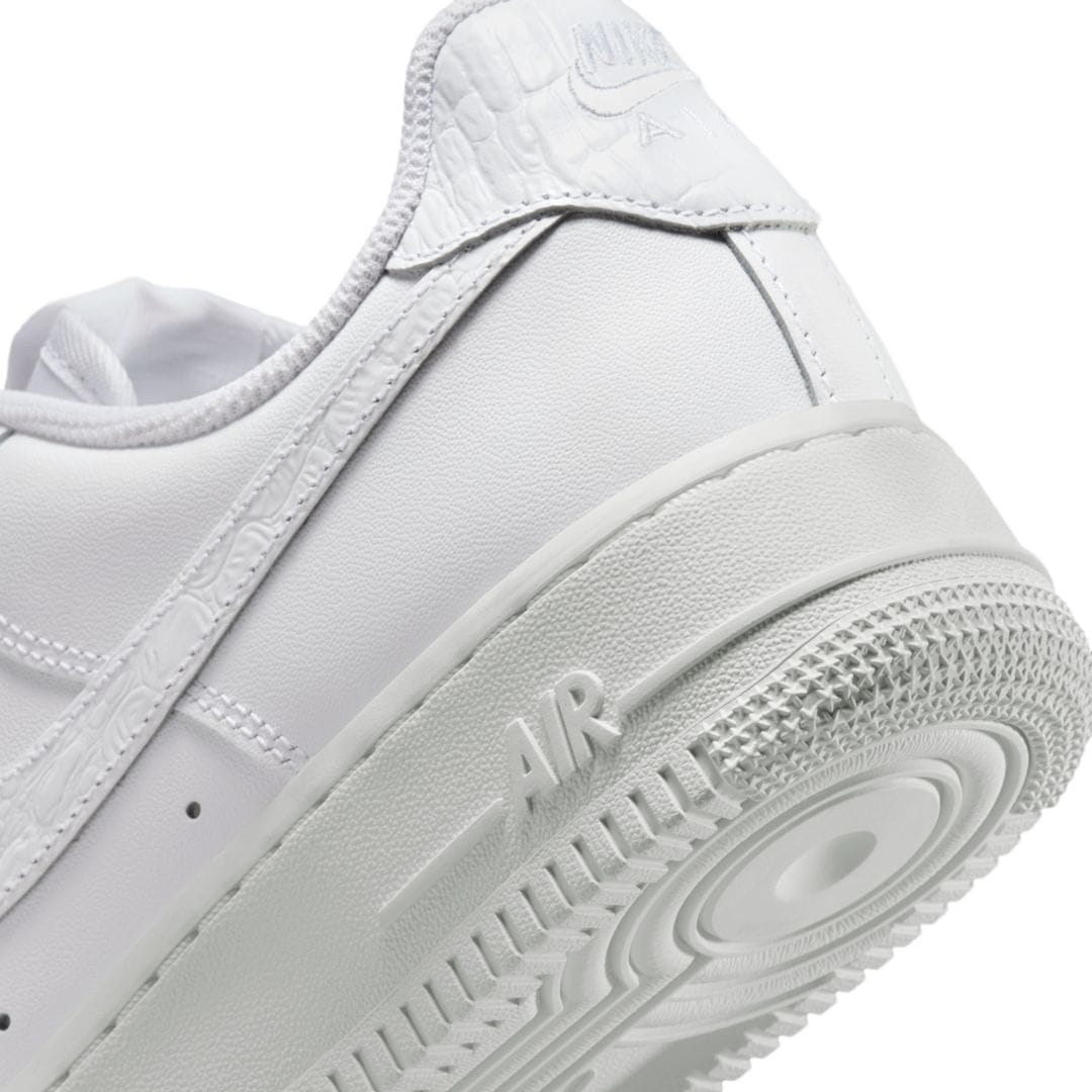 durable white sneakers with cushioned sole