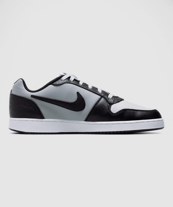 stylish black white sneakers for daily wear and gym